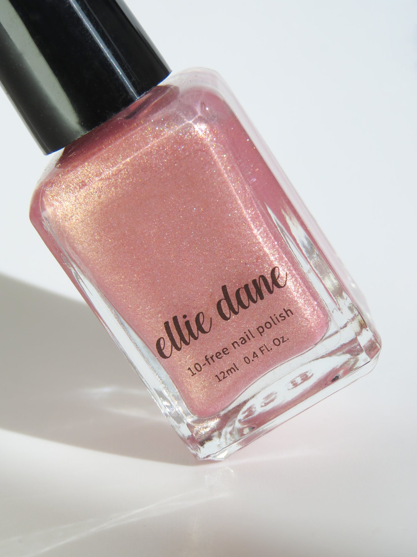 Champagne, Please rose gold shimmer pink nail polish bottle