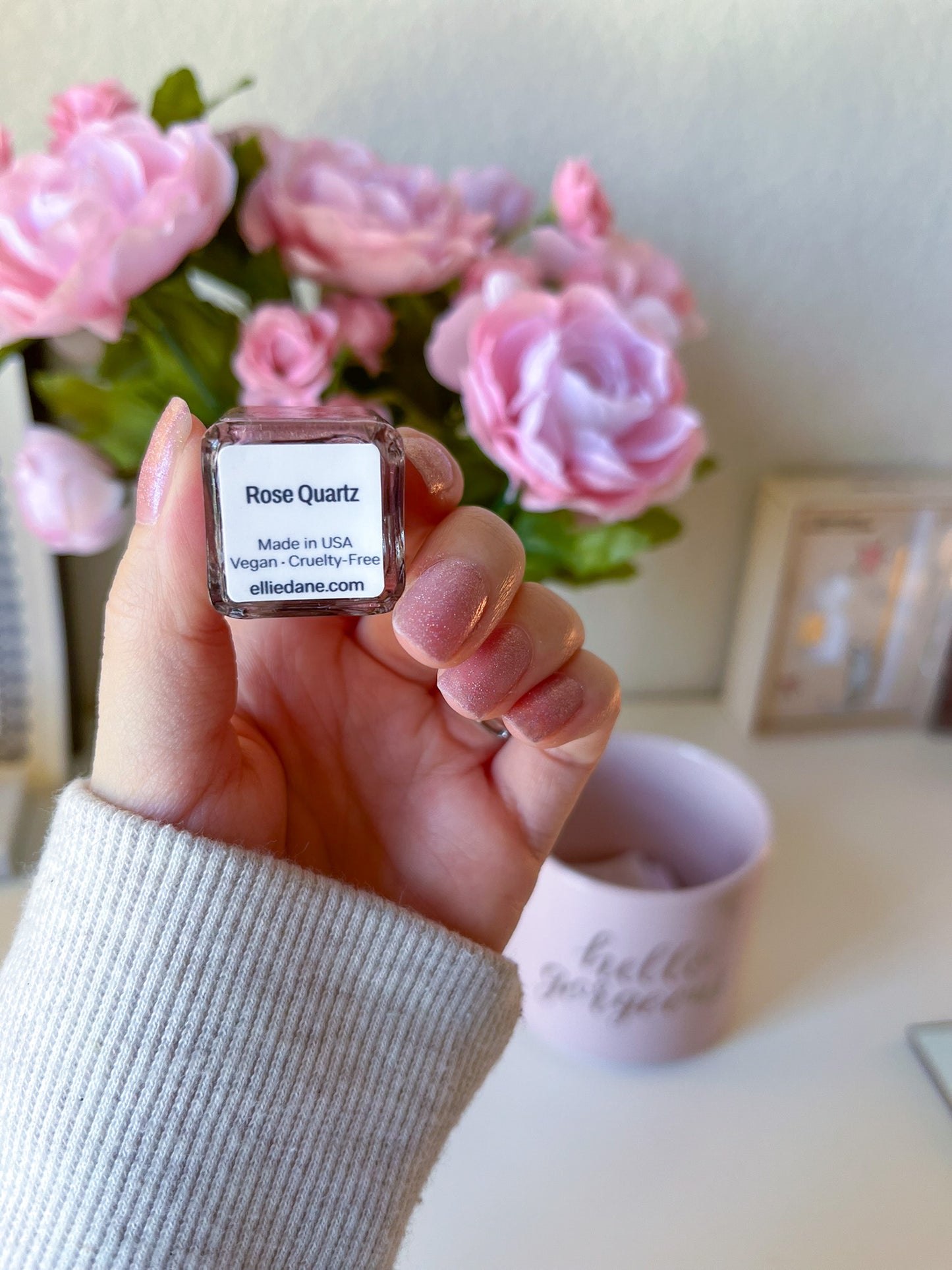 Bottom label of Rose Quartz pink glitter nail polish