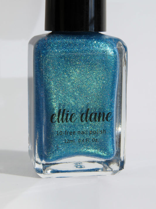 Laguna shimmer blue nail polish bottle by Ellie Dane Cosmetics