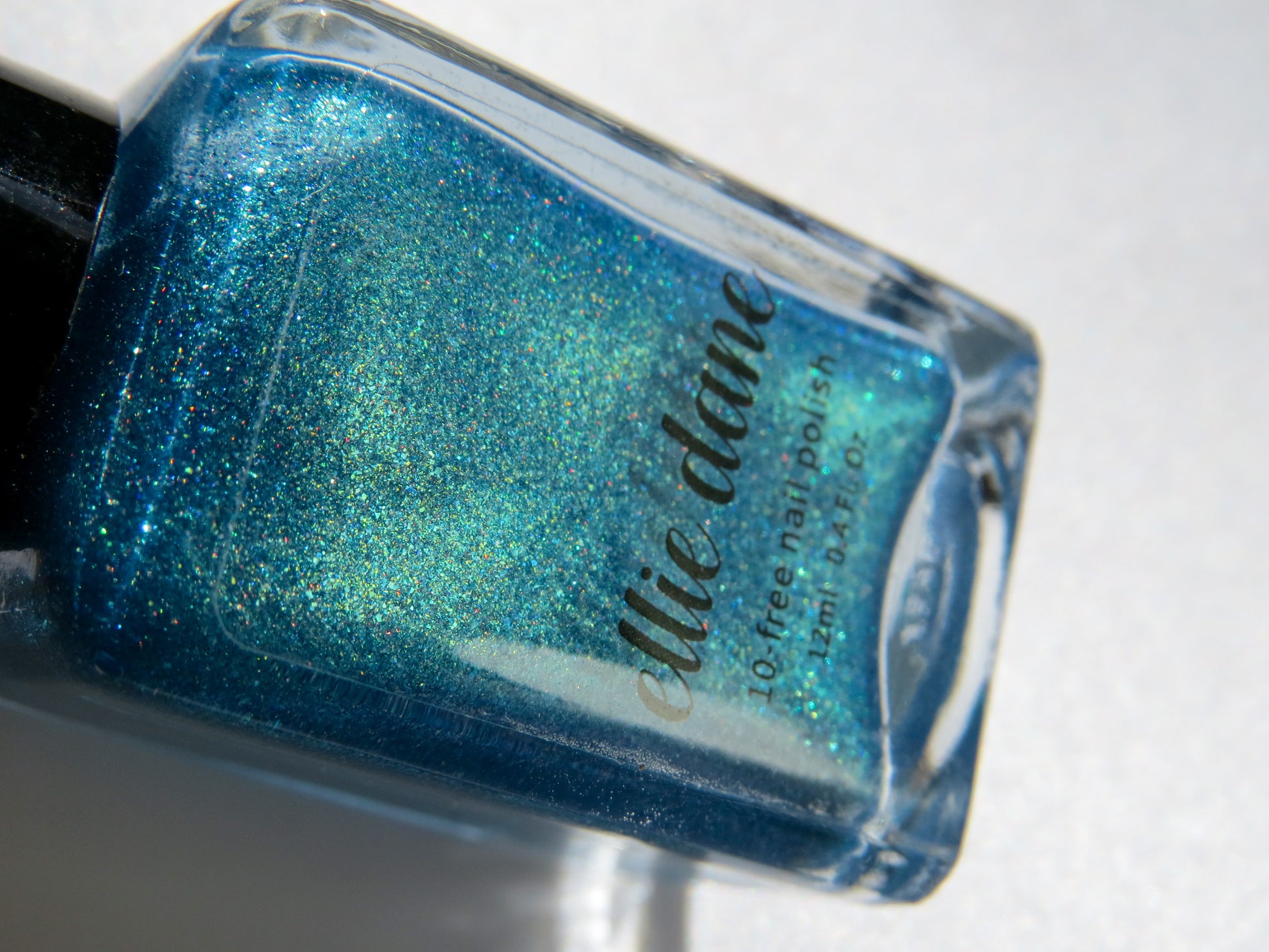 Up close of Laguna teal blue nail polish by Ellie Dane