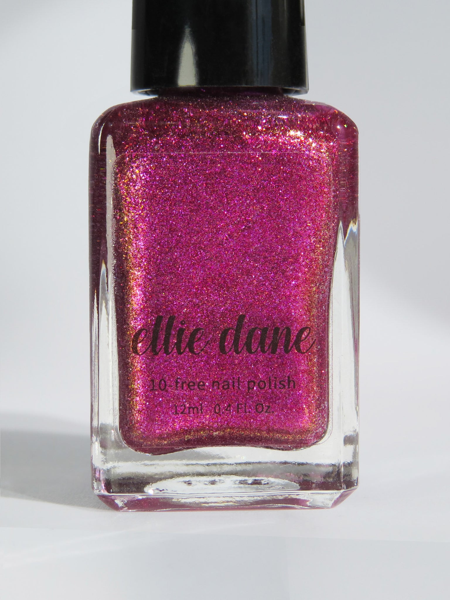 Love Letter Metallic Raspberry Nail Polish Bottle by Ellie Dane
