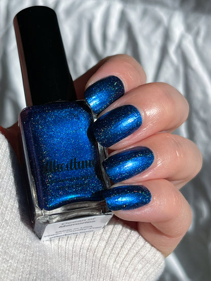 Ocean of Memories royal blue holographic navy nail polish painted on nails