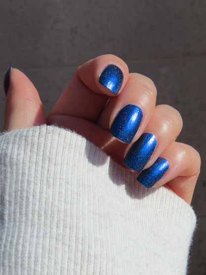 Ocean of Memories holographic blue nail polish swatched on nails 